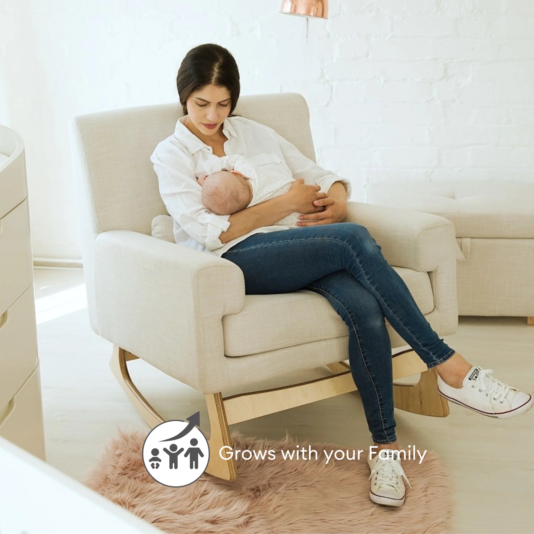 Mother feeding baby in Gaia Baby Serena rocking nursing chair with “Grows with your Family” feature text