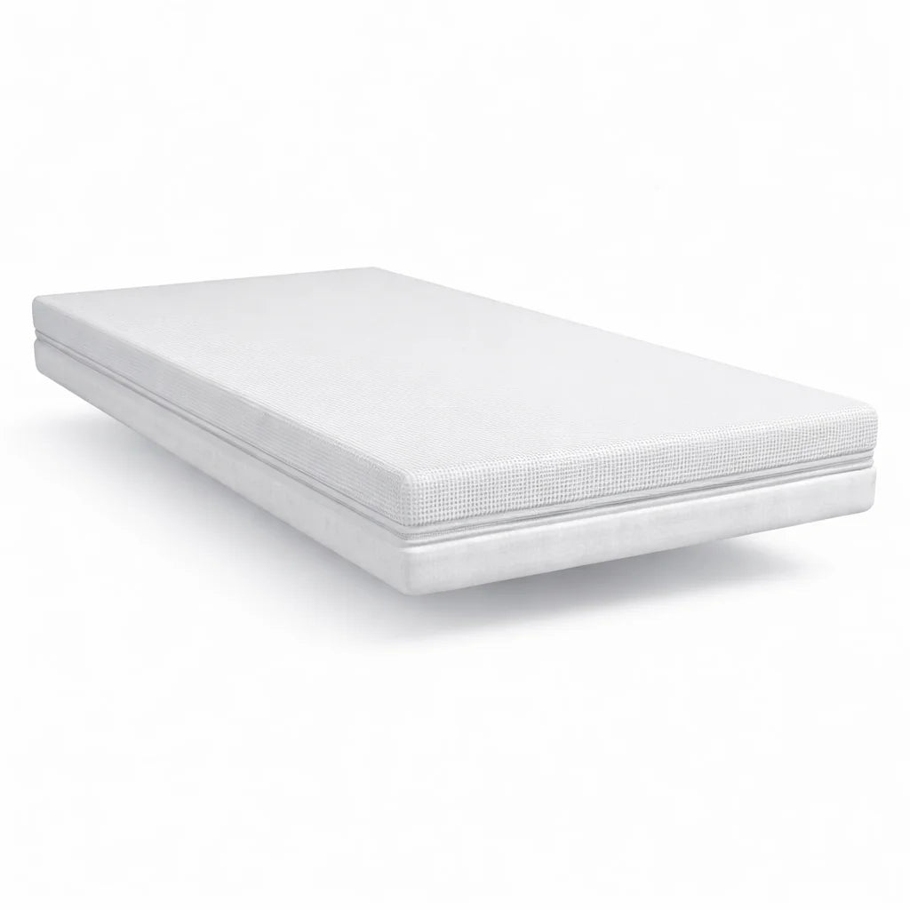 Gaia Baby Dual Fibre cot bed mattress on a white background.