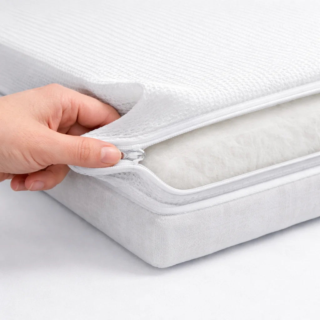 Gaia Baby Dual Fibre cot bed mattress with removable zip-off cover.