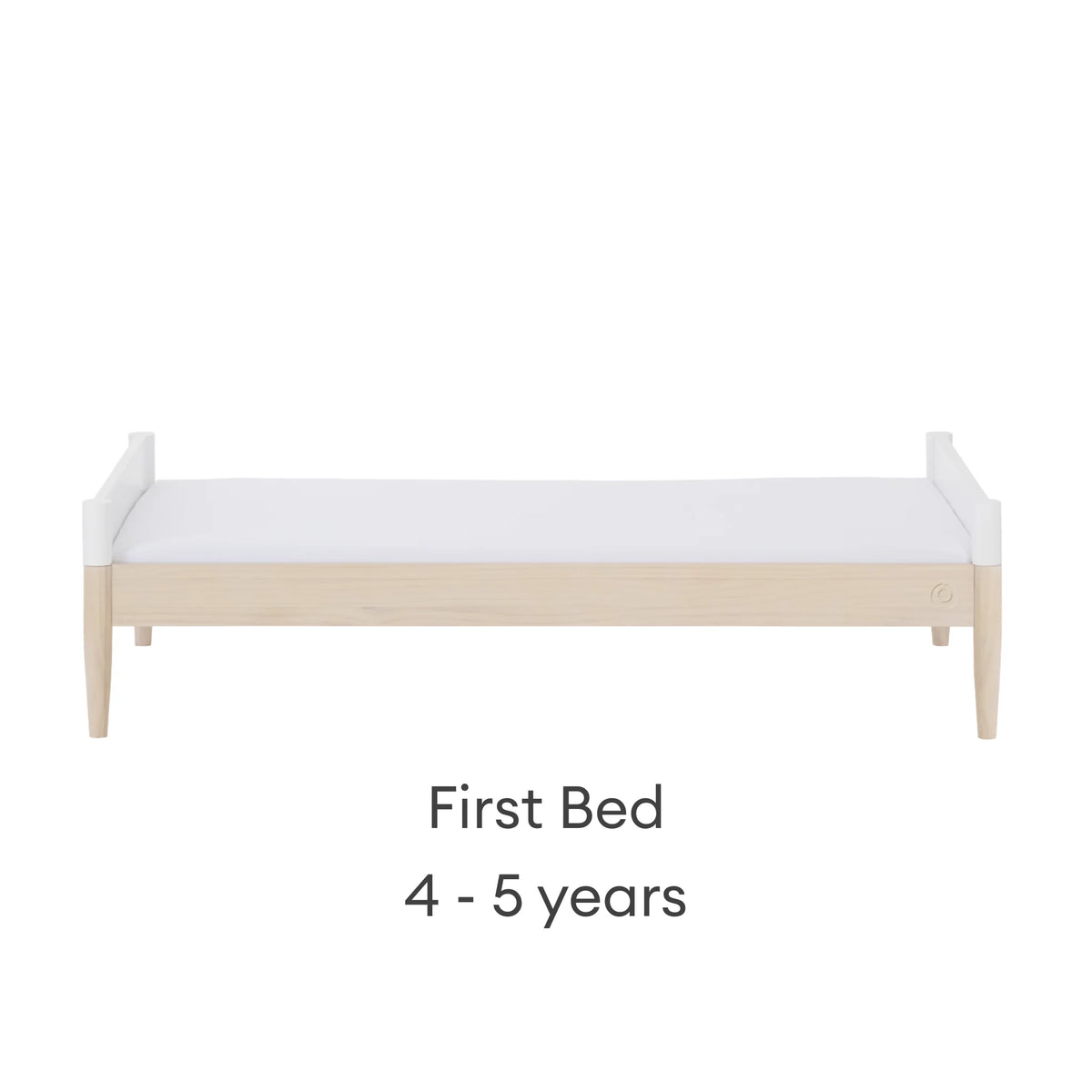 Gaia Baby EOS convertible cot bed converted into first bed stage in white and natural wood