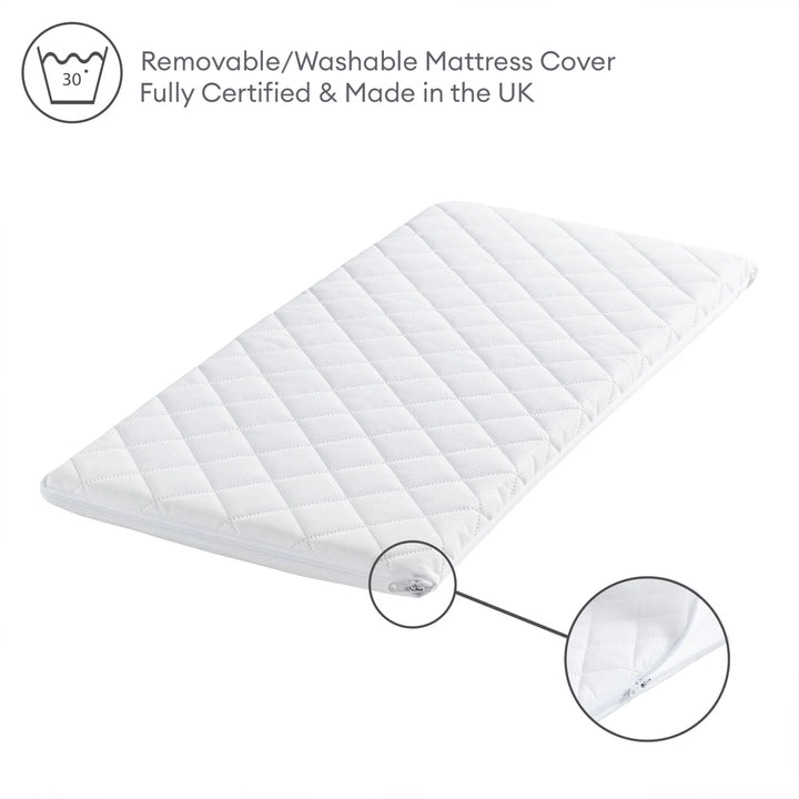 Hera bedside crib mattress with removable and washable mattress cover. It is fully safety certified and made in the UK.