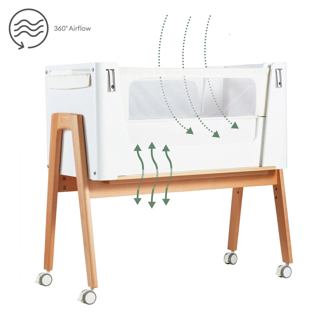 Gaia Baby Hera Bedside Crib in scandi white with 360 degree airflow through mesh panels and vented base.
