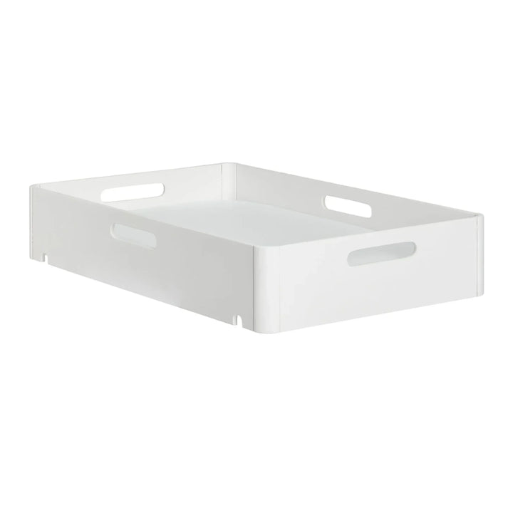 Angled view of Gaia Baby portable Hera baby changing station in white wood with removable waterproof changing pad insert.