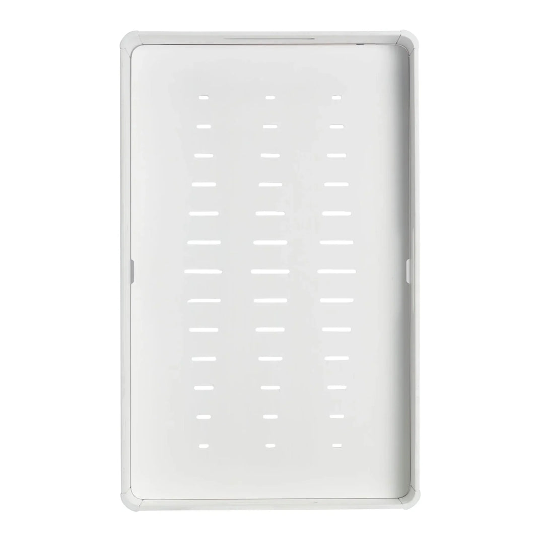 Inside view of Gaia Baby portable Hera baby changing station in white wood with changing pad removed to see ventilation.