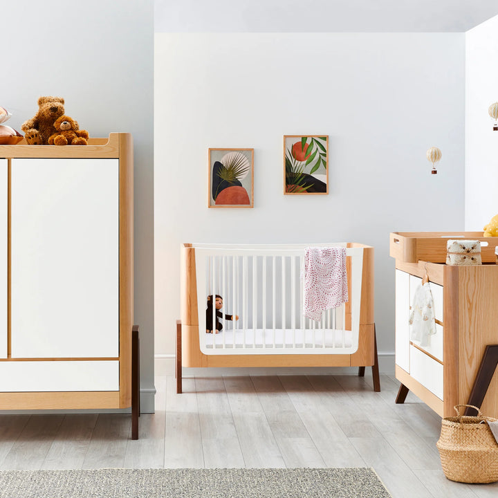 Hera Cot Bed with matching dresser, wardrobe and changing station in colourful nursery.