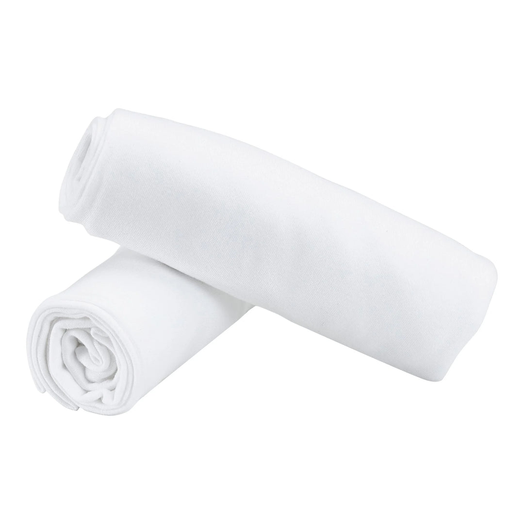 This image shows the set of two Hera Cot Bed fitted sheets one on top of the other.