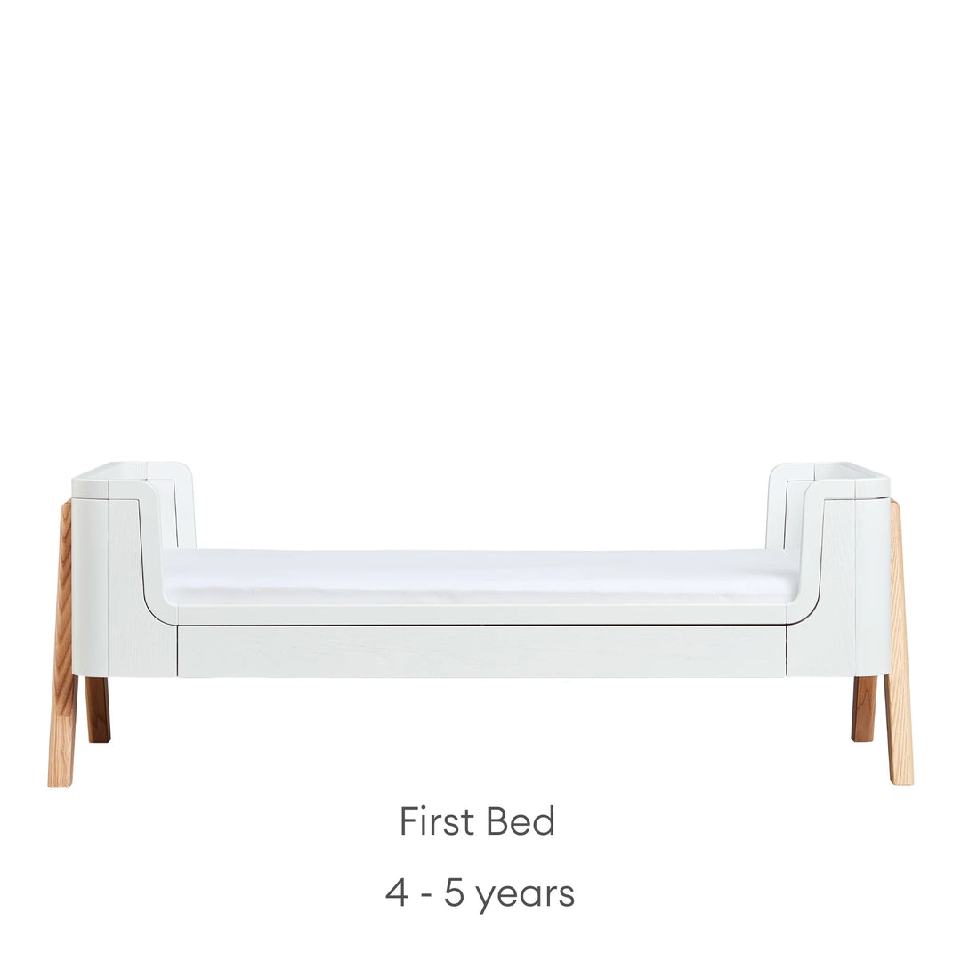 Hera Cot Bed Scandi White front view in first bed mode suitable from four to five years old.