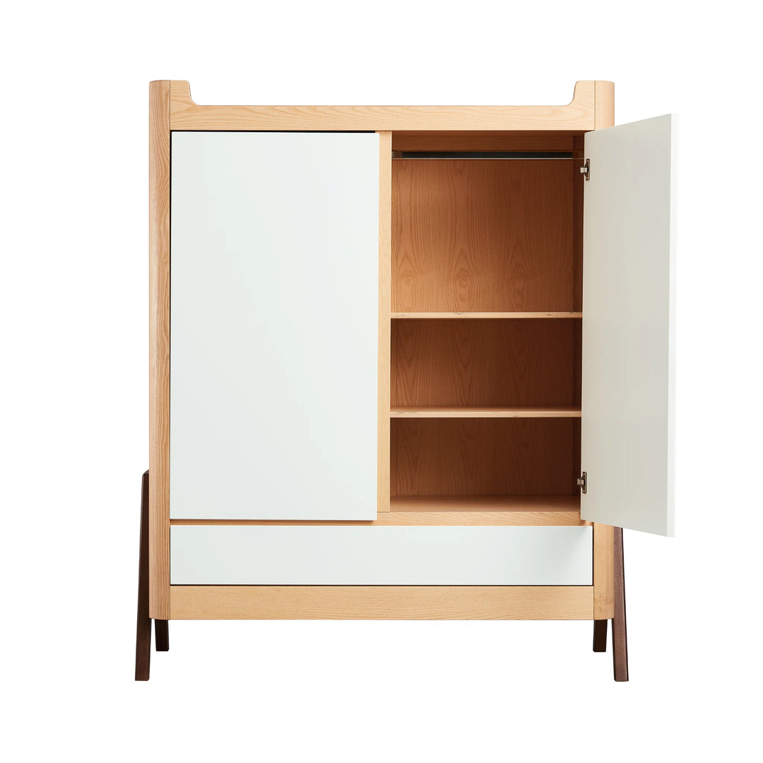 Front view of Gaia Baby Hera Nursery wardrobe in scandi white wood with right door open showing hanging rail and three shelves for storage of baby clothes.