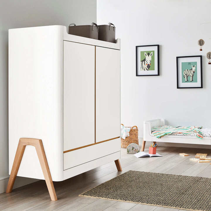 Hera wardrobe in scandi inspired nursery with doors closed.