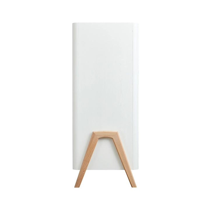 Side view of Gaia Baby Hera wardrobe in scandi white showing real wood grain and ash wood A-frame legs.