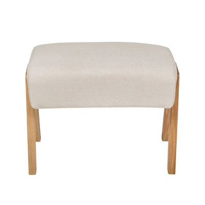 Hera Footstool Barley colour front view, upholstered nursery footrest with solid wood legs by Gaia Baby isolated on white.
