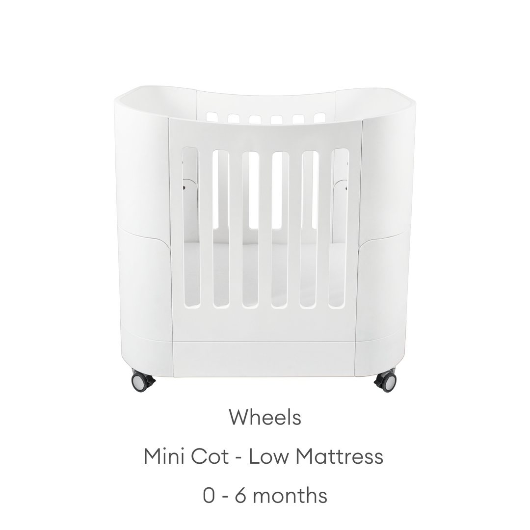 Mini crib on wheels on sale