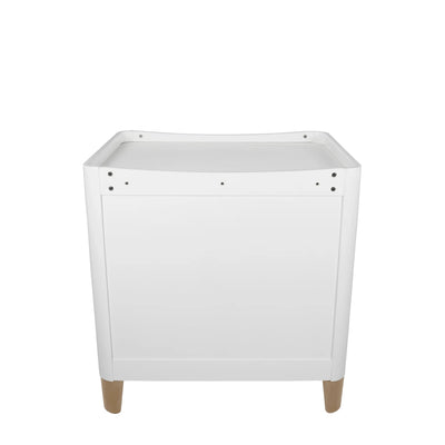 Back view of the Gaia Baby Serena Dresser with natural wood legs, featuring a clean white finish and minimalist Scandinavian-inspired design on a white background.