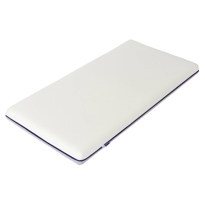 ClevaMama ClevaFoam premium support cot mattress in white with contoured design, shown on a white background