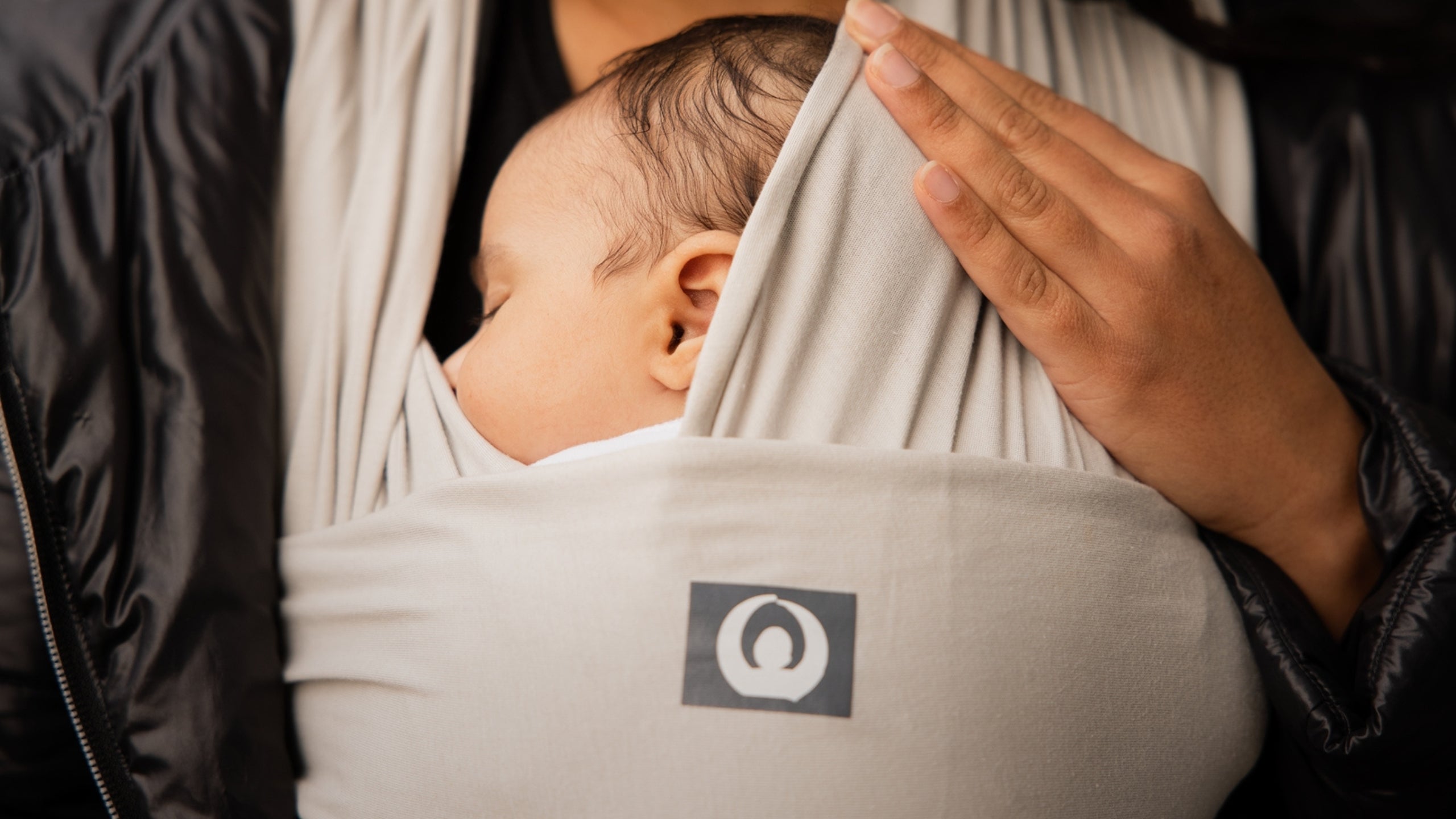 Babytragen und Tragebücher