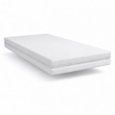 Gaia Baby Dual Fibre cot bed mattress on a white background.
