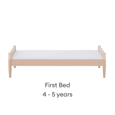 Gaia Baby EOS convertible cot bed in natural wood and powder blush converted to first bed for children 4 to 5 years