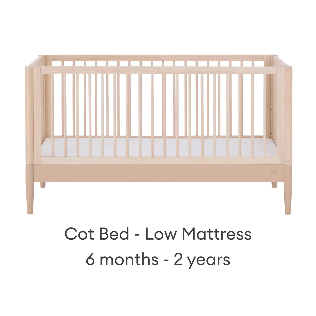 Gaia Baby EOS convertible cot bed in natural wood and powder blush with low mattress setting for babies 6 months to 2 years