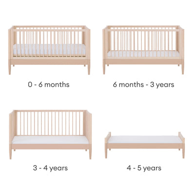 Gaia Baby EOS convertible cot bed in natural wood and powder blush showing four growth stages from newborn crib to toddler bed