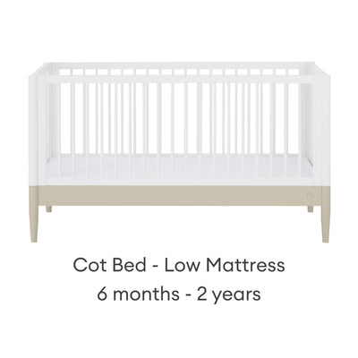 Gaia Baby EOS convertible cot in low mattress position for babies learning to sit or stand.