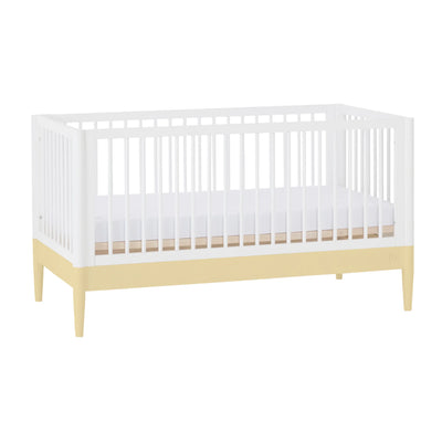 Lit bébé Gaia Baby EOS en angle blanc et jaune primevère vue du produit.