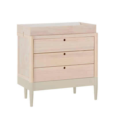 Gaia Baby EOS natural wood nursery dresser with changing top and three drawers angled view