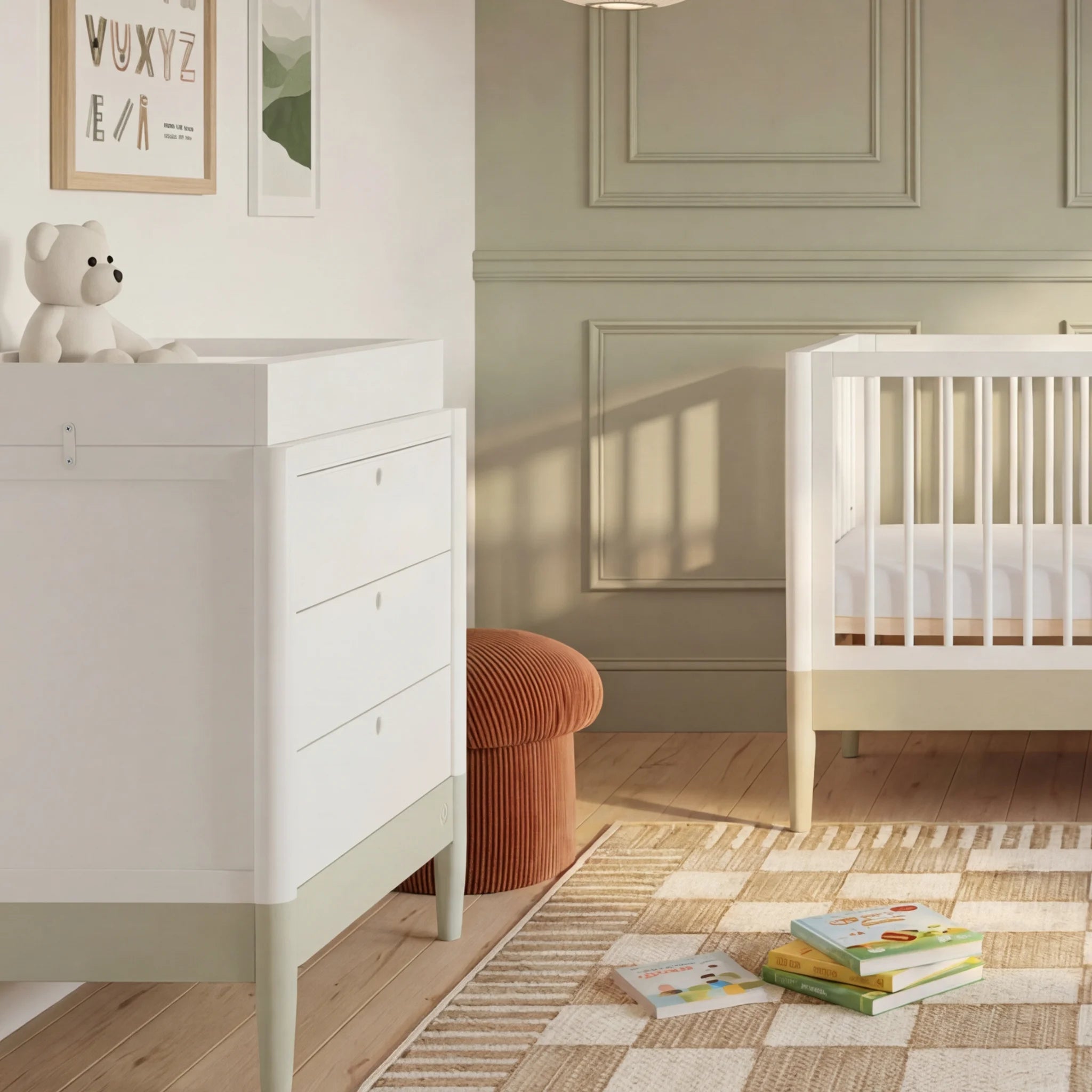 Gaia Baby EOS dresser with changing top in a sage green nursery.