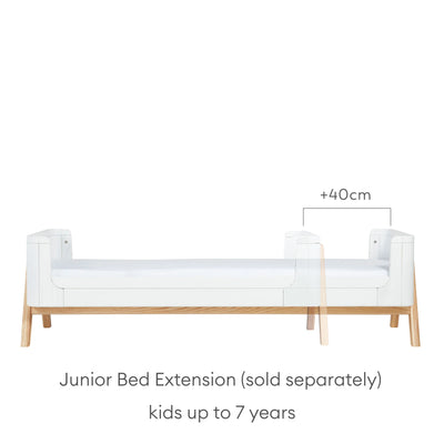 Front view showing the size difference between Gaia Baby Hera First Bed and Junior Bed in scandi white. Text reads: Junior Bed Extension (sold seperately) Suitable up to 7 years.