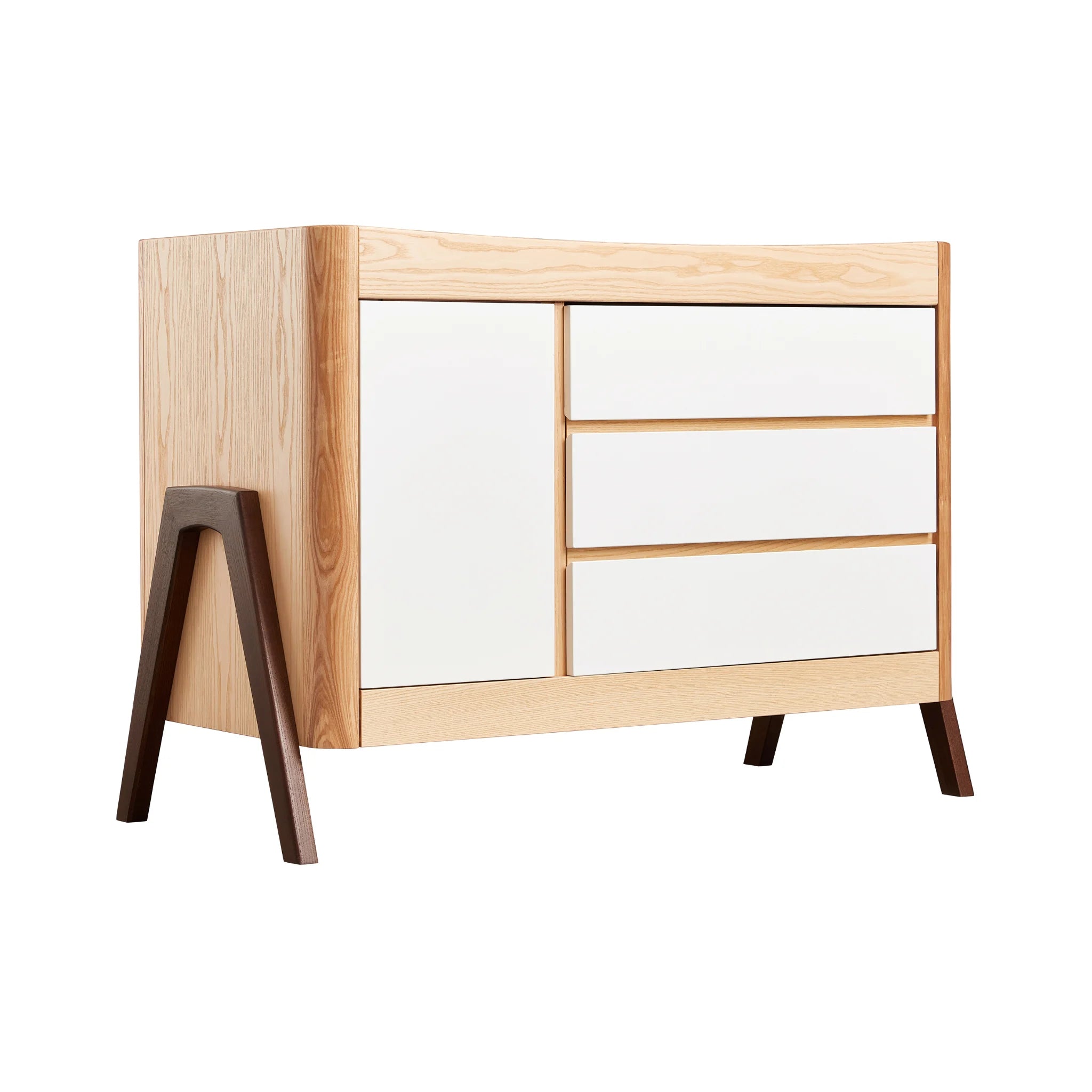 45 degree angle view of Gaia Baby Hera Nursery Dresser in white natural with 3 drawers, 1 cabinet door and a-frame legs in walnut wood.