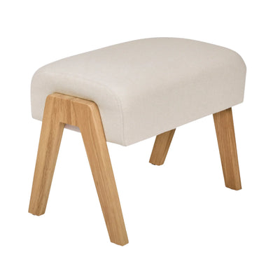 Hera Footstool Barley colour with wooden legs, upholstered nursery footrest by Gaia Baby isolated on white.