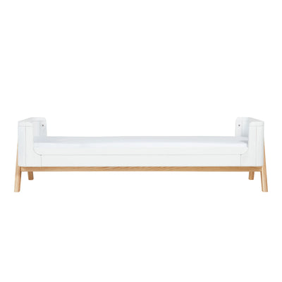Front view of the Gaia Baby Hera Junior Bed Extension Kit in Scandi White when added to the Hera Cot Bed.