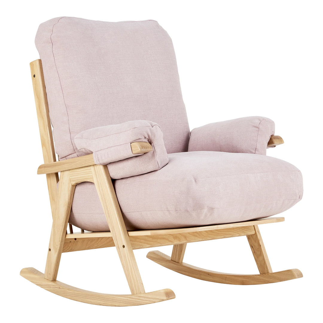 A side angle product image of Gaia Baby Hera rocking and nursing chair in blush colour
