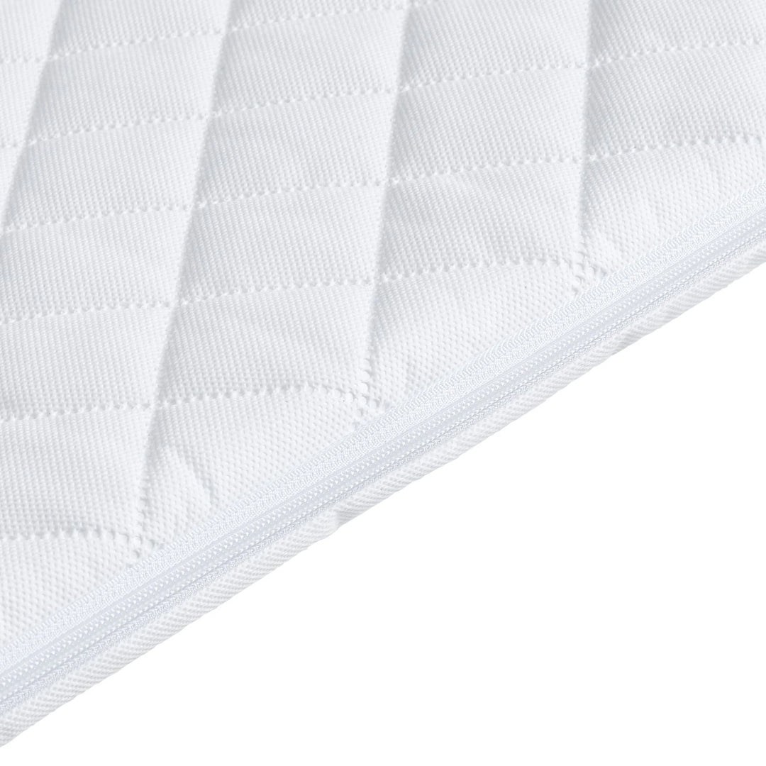 A close up product image of Gaia baby Hera Bedside Crib mattress zipper