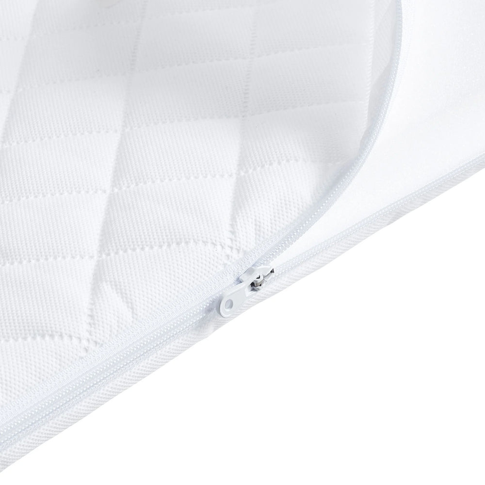 A close up product image of Gaia baby Hera Bedside Crib mattress zipper open