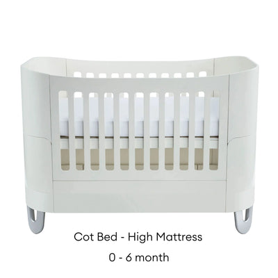White Gaia Baby Serena cot bed with high mattress setting for newborns aged 0–6 months
