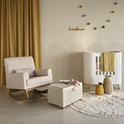 Gaia Baby Serena Nursing Chair in Ecru Corduroy. White corduroy nursing chair with a matching footstool with storage. Serena Mini Cot