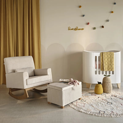 Gaia Baby Serena rocking chair and storage footstool in ecru corduroy styled in a modern nursery