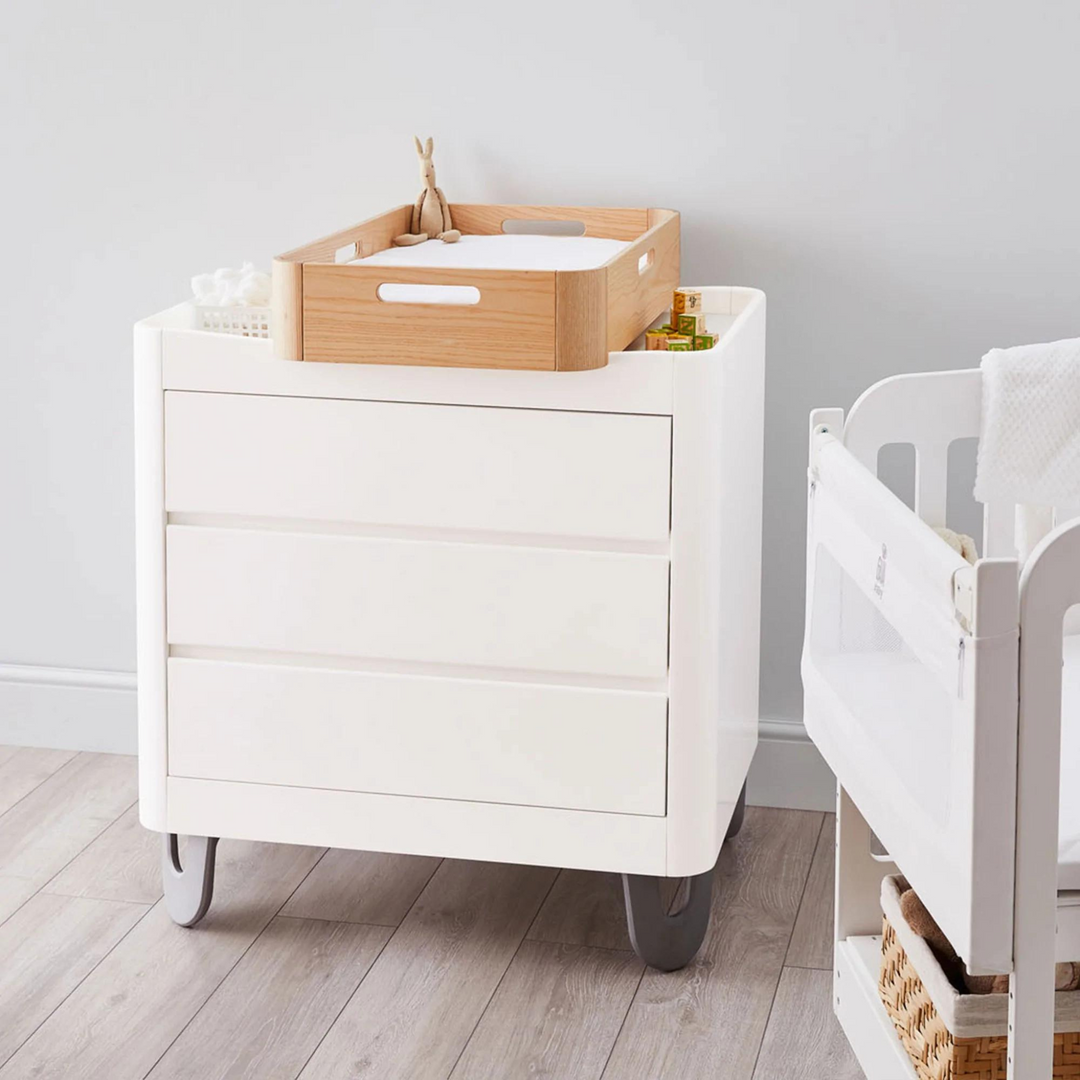 Gaia Baby Serena Dresser white. White modern dresser. Minimalist white solid wood dresser with a changing station
